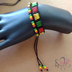 the bracelet is made with multicolored beads and beaded on top of a mannequin's head