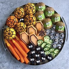 a platter filled with lots of halloween treats