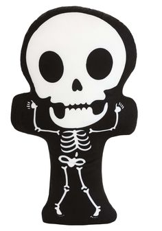 a black and white stuffed toy with a skeleton on it