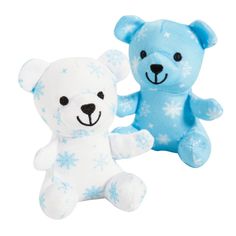 two teddy bears sitting next to each other on a white background with snowflakes