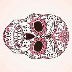 a sugar skull with pink flowers on it