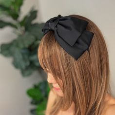 Enhance any outfit with our Satin Bow Crown Headband. The large, doubled bow adds a touch of elegance, while the slim body design ensures a comfortable fit for everyday wear. Perfect for any event, this headband will seamlessly elevate your look.Dimensions: approximately 11" x 4" x 2"Made In: China Stylish Scarves, Double Bow, Hair Setting, Body Design, Crown Headband, Satin Bow, Scrunchie Hairstyles, Elevate Your Look, Headband Hairstyles