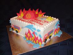 a birthday cake with a fire truck on it