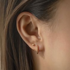 These Rose Gold Filled earrings will be your favorite everyday pairs. Our thin Huggies are true to size and will hug your ear perfectly. Great for those with smaller lobes or second piercings. Rose Gold Filled Hypoallergenic, lead and nickel free Thickness 1.2mm Inside Diameter 9mm Endless Hoop Closure #E020-RG Gold Earrings Two Holes, 2nd Ear Piercing, Ear Stacks, Ear Lobe Piercings, Accessory Inspo, Huggie Earrings Gold, Diamond Huggie Earrings, Earrings Minimal, Piercing Ideas