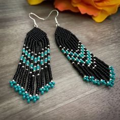 Southwestern inspired beaded fringe earrings made with miyuki seed beads. Southwestern Fringe Beaded Earrings As Gift, Southwestern Beaded Fringe Earrings As Gift, Southwestern Fringe Beaded Earrings For Gift, Southwestern Style Beaded Fringe Earrings For Gift, Southwestern Fringe Earrings With Round Beads, Beads With Beaded Fringe For Jewelry Making, Southwestern Beaded Fringe Dangle Earrings, Southwestern Style Beaded Fringe Dangle Earrings, Dangle Beads With Beaded Fringe For Jewelry Making