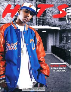 a man in a blue and orange jacket is standing on the cover of an magazine