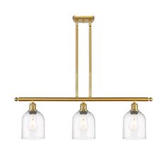 three lights hanging from the ceiling with clear glass shades on each light fixture and gold metal frame