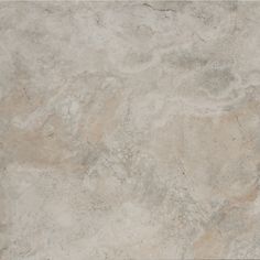 a white marble textured surface with grey and tan colors