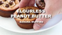 a person placing chocolate chips on top of peanut butter muffins with the words flourless peanut butter