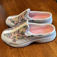 Nwot Easy Spirit Traveltime Clog Size Womens 6.5 M Color White With Multi Color Floral Man Made Uppers Slip On With Rounded Toe Orthotic Friendly Removable Sock Liner Arch Support Rubber Outsole All Day Wear, Highly Rated New Condition Offer Welcome White Synthetic Closed Toe Slip-ons, Low-top Clogs With Rubber Sole For Spring, Spring Low-top Clogs With Rubber Sole, White Spring Clogs With Flat Heel, White Non-slip Slip-ons With Round Toe, White Flat Heel Clogs For Spring, Spring Slip-on Slip-resistant Walking Shoes, Spring Slip-resistant Slip-on Clogs, Spring Slip-on Slip-resistant Clogs