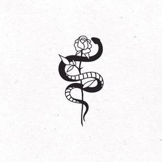 a snake and rose tattoo design on white paper