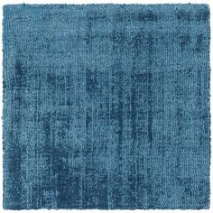 a blue rug on a white background