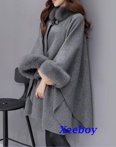 Oversized Winter Cape, Winter Long Sleeve Solid Color Cape, One Size Winter Cape, One Size Winter Poncho, One Size Cape For Cold Weather, One Size Winter Poncho In Solid Color, Winter Poncho In One Size, Oversized Shawl Outerwear For Winter, Oversized Shawl Winter Outerwear