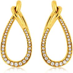 Savor the sophistication of superior craftsmanship in these breathtaking diamond earrings, meticulously designed to capture the essence of elegance and style. Crafted in 14K yellow gold, these earrings offer a luxurious golden hue that perfectly complements the dazzling brilliance of the diamonds. The sleek teardrop shape is both timeless and modern, offering a unique twist with a delicate cross-over design at the top that adds a touch of intrigue.Each earring features a total of 0.32 carats of radiant diamonds, arranged in a stunning pave setting that sparkles from every angle. The diamonds, carefully selected for their exceptional clarity and fire, are gracefully embedded along the elegant curve, creating a mesmerizing play of light. The smooth, polished finish of the yellow gold enhance Teardrop Diamond, Everyday Elegance, Jewelry Appraisal, Radiant Diamond, Diamond Education, Ring Pendant Necklace, Pave Setting, Royal Jewelry, Womens Wedding Bands