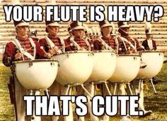 a group of men in uniforms playing drums with caption that reads, your flute is heavy? that's cute