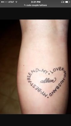 a tattoo with words written on it and an image of a heart in the middle