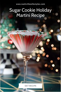 a martini glass with candy canes in it and the words sugar cookie holiday martini recipe