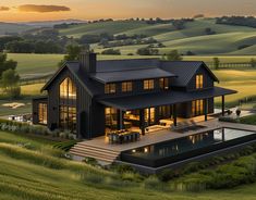 an aerial view of a house with a pool in the foreground and rolling hills behind it