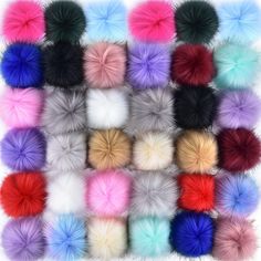 many colors of pom poms are arranged in a square pattern on a white background