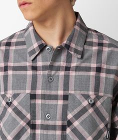 It's the little details that make the difference in Neighborhood's designs. That's the case with this cotton shirt, which features a gray and pink plaid motif with various slants throughout the garment: vertically on the front and back, and diagonally on the chest pockets and yoke. The logo label, sewn on the left pocket, adds the finishing touch to the design. Casual Pink Cotton Flannel Shirt, Pink Cotton Shirt With Pockets, Plaid Yarn-dyed Cotton Tops, Shirt Model, Logo Label, Pink Plaid, Flannel Shirt, Chest Pocket, Cotton Shirt