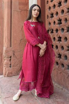 Pink straight kurta with sequin embroidered floral motifs. Comes with inner, pant and sheer dupatta.
Component: 4
Embroidery
Neckine: Kurta: Round; Inner: Scoop
Sleeve Length: Kurta: Three fourth
Fabric: Silk Chanderi, Cotton, Organza
Color: Pink
Floral embroidered scallop border on dupatta
Floral embroidered scallop hem on pant
Pleated detail on kurta
Scallop border on kurta neckline
Floral embroidered scallop hem on inner - Aza Fashions Chanderi Kurta, Kurta Set For Women, Fancy Kurti, Silk Kurta, Suits Design, Ethnic Dress, Organza Dupatta, Cotton Suits, Indian Designer Outfits