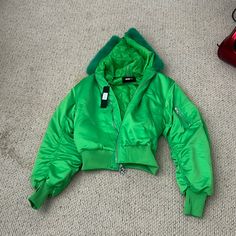 Nova Men Jacket Never Worn Solid Color Spring Parka For Streetwear, Spring Streetwear Solid Color Parka, Spring Streetwear Solid Parka, Green Winter Windbreaker, Green Windbreaker With Pockets For Cold Weather, Urban Green Puffer Jacket For Fall, Green Puffer Jacket With Padded Collar For Streetwear, Hooded Puffer Windbreaker For Spring, Spring Streetwear Puffer Windbreaker