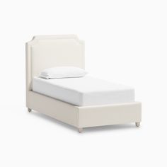 a bed with white linens and pillows on it's headboard, in front of a white background