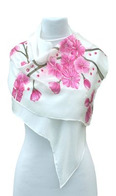 Hand-painted silk scarf made of 100% natural silk Habotai 8. It's painted with high-quality colors that are fixed with steam, thanks to which the softness and shine of the silk has been preserved. On one third of the scarf, the flowers are painted in shades of pink and cyclamen. The scarf is sent in a gift box. Care: wash by hand in lukewarm water with a mild detergent or hair shampoo. Spread out to allow to air dry. Iron from the reverse side. Size: 180 x 45 cm This scarf is designed and hand painted by me and signed with a name Aryonelle. You can see more of my silk scarves here: https://www.etsy.com/shop/Aryonelle?ref=seller-platform-mcnav§ion_id=17363621 You can see my hair ornaments here: https://www.etsy.com/shop/Aryonelle?ref=simple-shop-header-name&listing_id=578128768&section_id=4 Crinkle Scarf, Painted Scarf, Floral Silk Scarf, Silk Bow Ties, Silk Scarf Painting, Hand Painted Silk Scarf, Silk Art, Silk Flower Arrangements, Scarf Silk