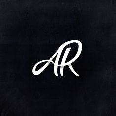 the letter ar is written in white on a black background