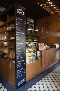 the inside of a restaurant with menus and food