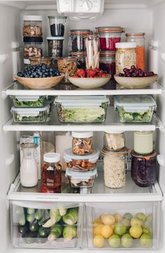 an open refrigerator filled with lots of food