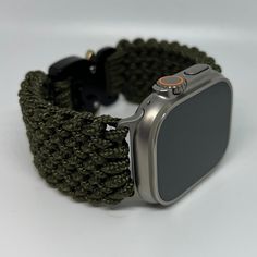 "Handcrafted with 100% Nylon Paracord \"MADE IN USA\".   Our Products include:    ➖Custom handcrafted watch bands \"According to You\". No matter how small or big your wrist size, we will craft your perfect fitting band (wrist size picture measurement required).  ➖Variety of styles to choose from. You may order your band \"As pictured\", or feel free to request changes. If you don't see your favorite style in our page or watch category yet, please contact us and we can discuss your options.  ➖Va Adjustable Silver Watch Bands For Outdoor Use, Adjustable Durable Green Watch Bands, Handmade Adjustable Green Watch Bands, Handmade Green Watch Bands For Everyday Use, Handmade Adjustable Apple Watch Band, Customizable Adjustable Apple Watch Band For Outdoor, Custom Handmade Adjustable Apple Watch Band, Adjustable Green Apple Watch Band, Adjustable Green Apple Watch Band For Everyday Use