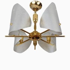 Style: Italian Modern, Modernist
Design Period: 1970 to 1979
Materials: Aluminum, Metal
Color: gold, silver
Dimensions: Width: 45, Depth: 45, Height: 42 Flower Chandelier, Vintage Flowers, Ceiling Fan, 1970s, Modern Design, Ceiling Lights, Flowers, Silver, Gold