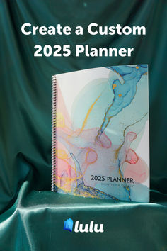 a planner book sitting on top of a green cloth covered chair with the title create a custom 2020 planner