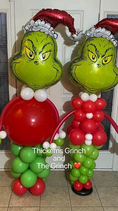 two balloons in the shape of dr seuss and grin