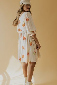 Square necked and joyously fabulous. Simple watercolor flowers in vibrant hues create a spring dress worth twirling about. A babydoll silhouette with poet sleeves, she has all the characteristics for a winning ensemble to any occasion. Family photos, spring weddings, and everything in between. Shop the rest of the collection: SALT Lined Zipper enclosure // paired with the free people essential chelsea boots in ivory + the linen newsboy cap Flowy Floral Print Dress With Balloon Sleeves, Flowy Balloon Sleeve Floral Dress, Spring Dress With Gathered Sleeves For Gatherings, Spring Dress With Short Sleeves For Gatherings, Spring Dress For Gatherings With Short Sleeves, Spring Dresses With Gathered Sleeves For Gatherings, Spring Long Sleeve Dresses For Gatherings, Spring Gatherings Long Sleeve Dresses, Long Sleeve Dresses For Spring Gatherings