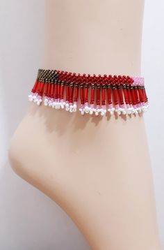 Handmade Boho Womens Girls Seed Bead Woven Geo Colorblock Adjustable Size Boho Fringed Anklet Native Tribal Red Jewelry Excellent Gift Beautiful handmade special fringed stitch....very complicated and GORGEOUS! Seed beads in red pinks white silver. Fringed anklet is adjustable with handmade bead ball and 3 loops 9 to 10 inches. Super high quality. Treasured gift comes in box. Easy to wear casual chic vintage for the disco sporting life. **Please note the color differences, color/contrast vary wi Adjustable Red Anklets With Round Beads, Red Beaded Bracelets With Tiny Beads For Party, Red Beaded Bracelet With Tiny Beads For Parties, Red Tiny Beaded Bracelets For Party, Pink Beaded Bohemian Anklets, Pink Bohemian Beaded Anklets, Multicolor Beaded Anklets For Party, Traditional Red Beaded Bracelets For The Beach, Beach Red Beaded Choker