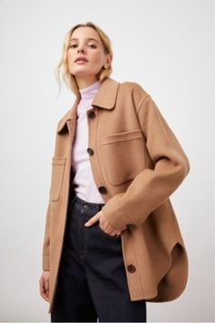 This oversized shirt jacket by Rails is the perfect fusion of cozy and chic! This style features a dropped shoulder, patch pockets, horn buttons, and side slits at the hem for breathability. Available in a rich camel-colored wool blend. Neutral Outerwear With Patch Pockets And Long Sleeves, Neutral Long Sleeve Outerwear With Patch Pockets, Neutral Shacket For Workwear, Oversized Neutral Shacket For Work, Oversized Workwear Shacket With Flap Pockets, Beige Fall Shacket With Patch Pockets, Oversized Shacket With Flap Pockets For Work, Chic Fall Shacket With Flap Pockets, Casual Wool Coat With Button Cuffs For Fall