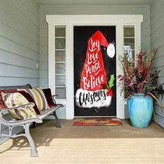 the front porch is decorated with holiday decorations