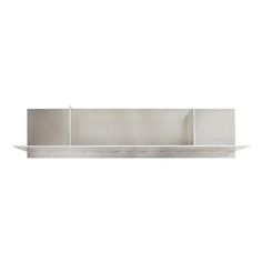 a stainless steel shelf with two shelves on each side and one in the middle, against a white background