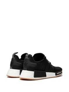 Adidas NMD_R1 Primeblue "Core Black/Core Black/Gum" Sneakers - Farfetch Urban Sneakers With Logo Patch For Streetwear, Adidas Urban Sneakers With Gum Sole, Urban Adidas Lace-up Running Shoes, Sporty Running Shoes With Logo Patch, Streetwear Running Shoes With Rubber Sole, Adidas Custom Sneakers With Gum Sole For Sports, Custom Streetwear Sneakers With Logo Patch, Custom Sneakers With Logo Patch For Streetwear, Urban Sneakers With Logo Patch For Sports