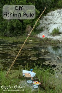 a fishing pole sitting on top of a river