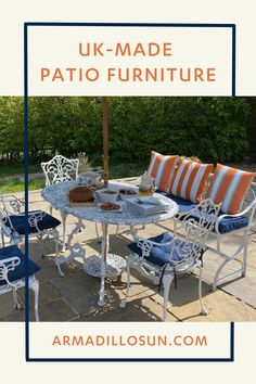 an outdoor patio furniture set with blue and white cushions