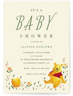 a baby shower is shown with winnie the pooh on it's chest and flowers