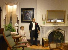 a man and woman standing in a living room