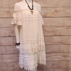 Dress Off Shoulder Nwt. Gorgeous. Can Be Worn Off Shoulder Or Normal. Gorgeous Detail. 100% Polyester. Dress Up Or Down With Accessories. Accessories Not Included. #1251 Bohemian Off-white Mini Dress With Ruffles, Off White Bohemian Mini Dress With Ruffles, Chic Boho Dress With Lace Trim, Bohemian Off-shoulder Day Dresses, Dress Off Shoulder, Polyester Dress, Off Shoulder, Dress Up, Midi Dress