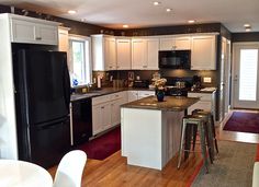 the kitchen is clean and ready to be used as a dining room or family room