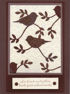 a card with two birds on a tree branch and the words, you are loved