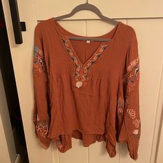 Never Worn Brown Long Sleeve Top With Floral Embroidery, Bohemian Embroidered Brown Tops, Brown Embroidered Long Sleeve Blouse, Brown Floral Embroidered Long Sleeve Top, Spring Embroidered Brown Top, Embroidered Brown Tops For Spring, Bohemian Embroidered Top With Tonal Embroidery For Fall, Brown Floral Embroidery Blouse For Fall, Fall Floral Embroidery Brown Blouse