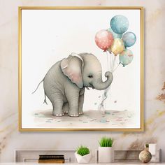 an elephant is holding balloons in its trunk